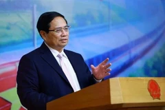 El primer ministro Pham Minh Chinh interviene en la conferencia. (Fuente: VNA)